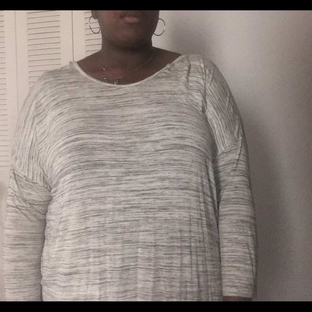 white and grey/blue top